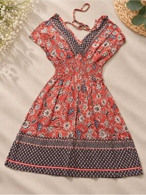 Floral V‑Neck Smocked Midi Dress